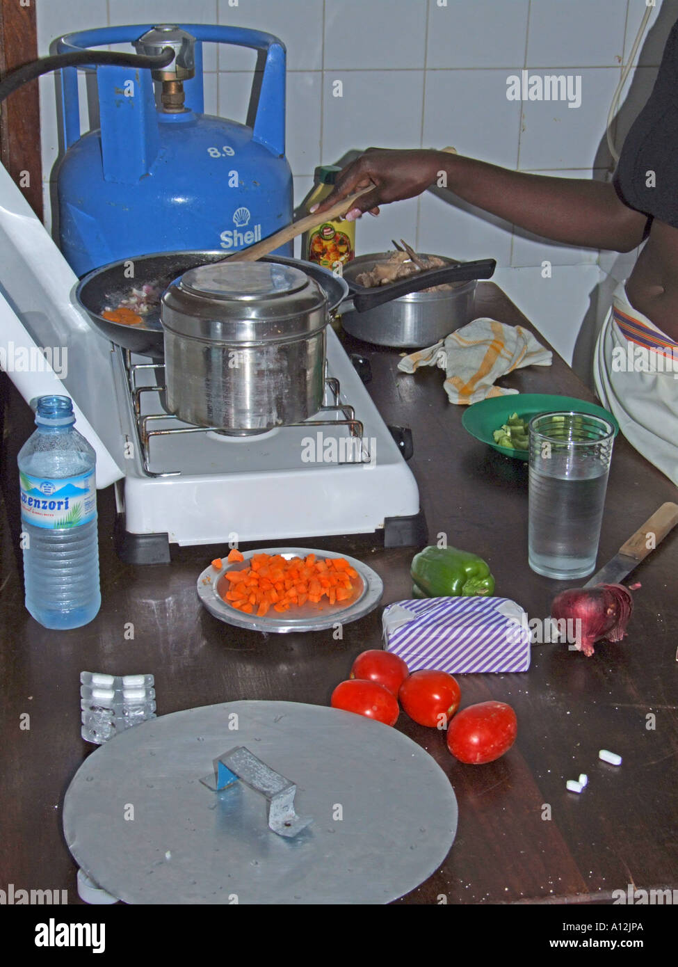Cooking on a gas stove Stock Photo Alamy