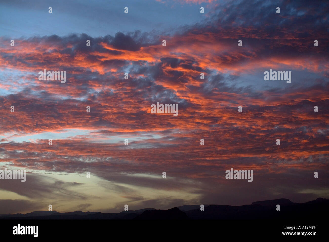Sunset clouds in the sky background Stock Photo - Alamy