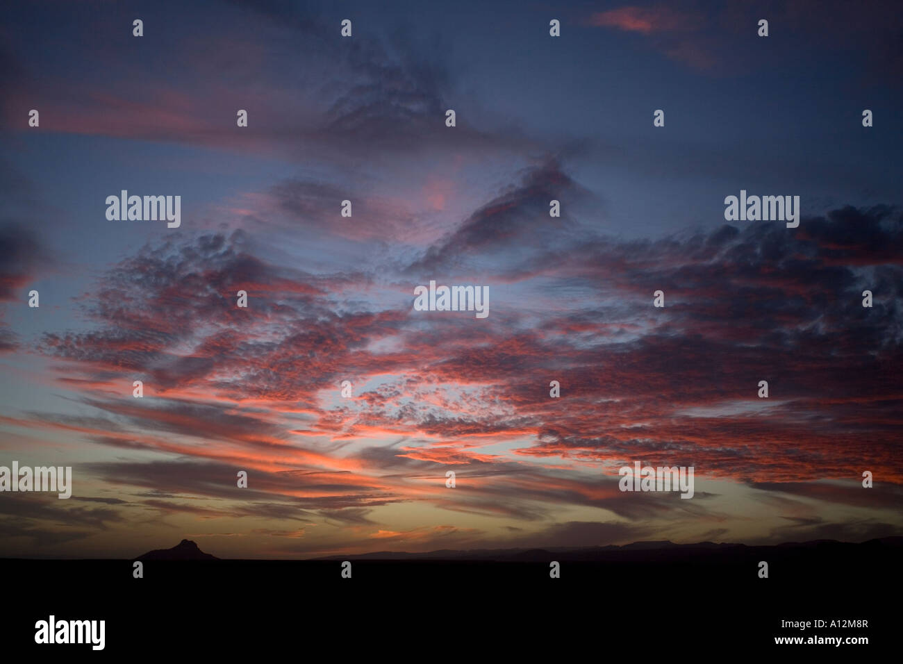 Sunset clouds in the sky background Stock Photo - Alamy
