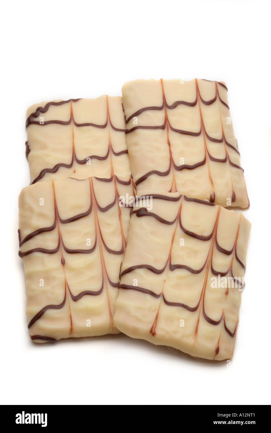 white chocolate cinnamon biscuite four rectangle oblong drag pattern florentine texture Stock Photo