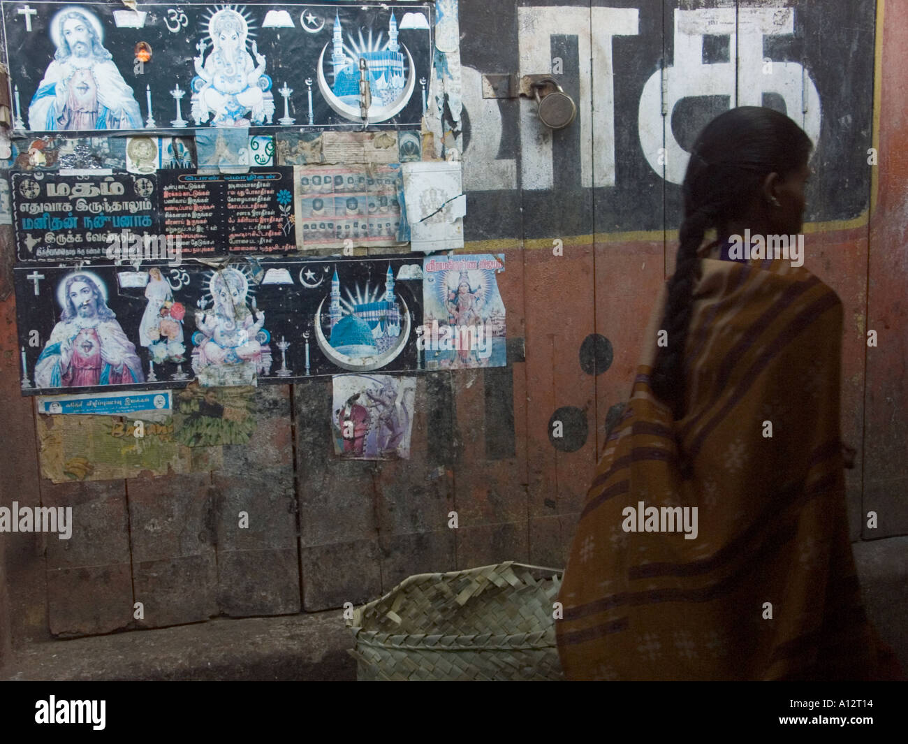 Hindu and Christian iconography posted side by side Stock Photo