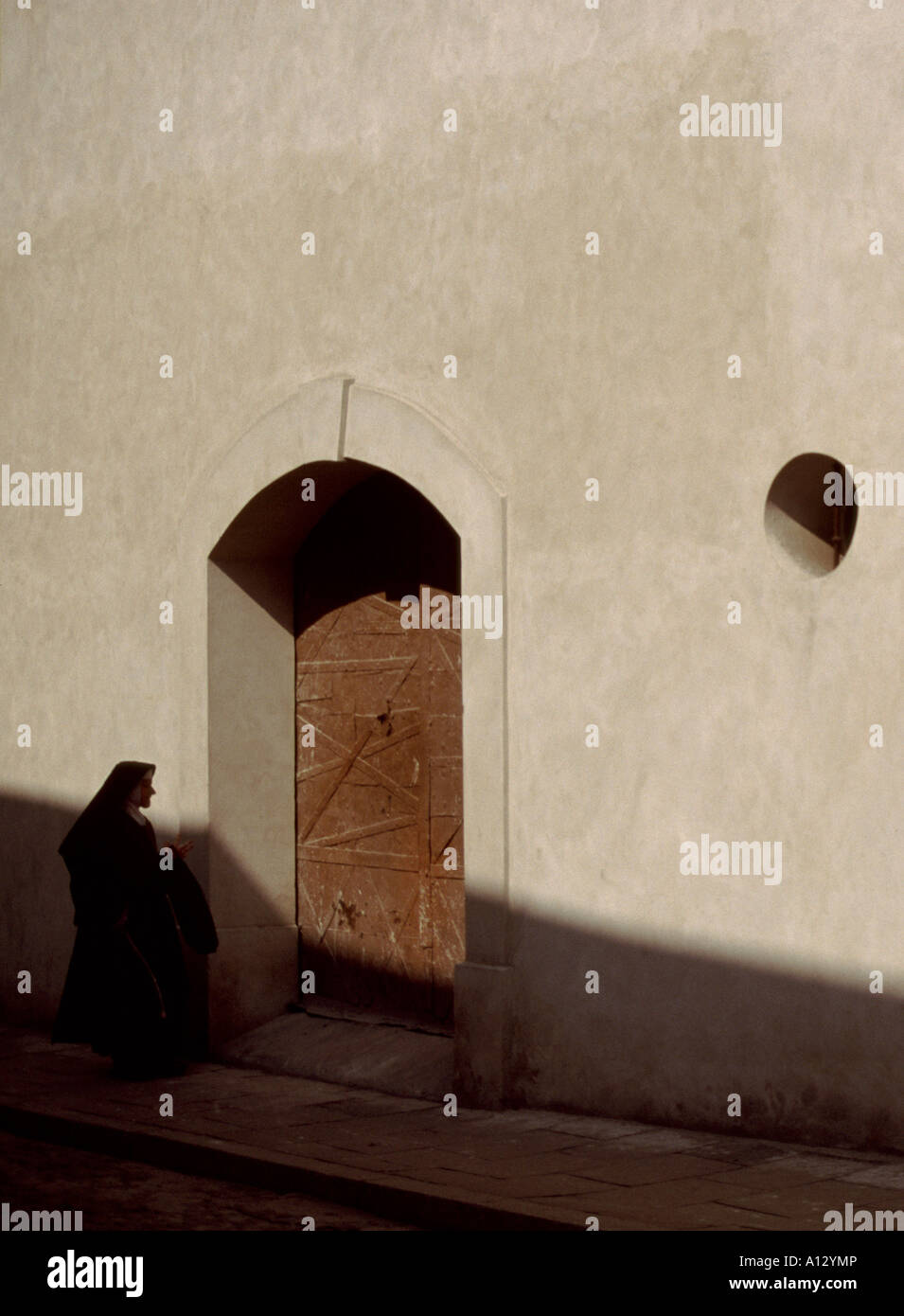 Nun in a Krakow street in Poland Stock Photo