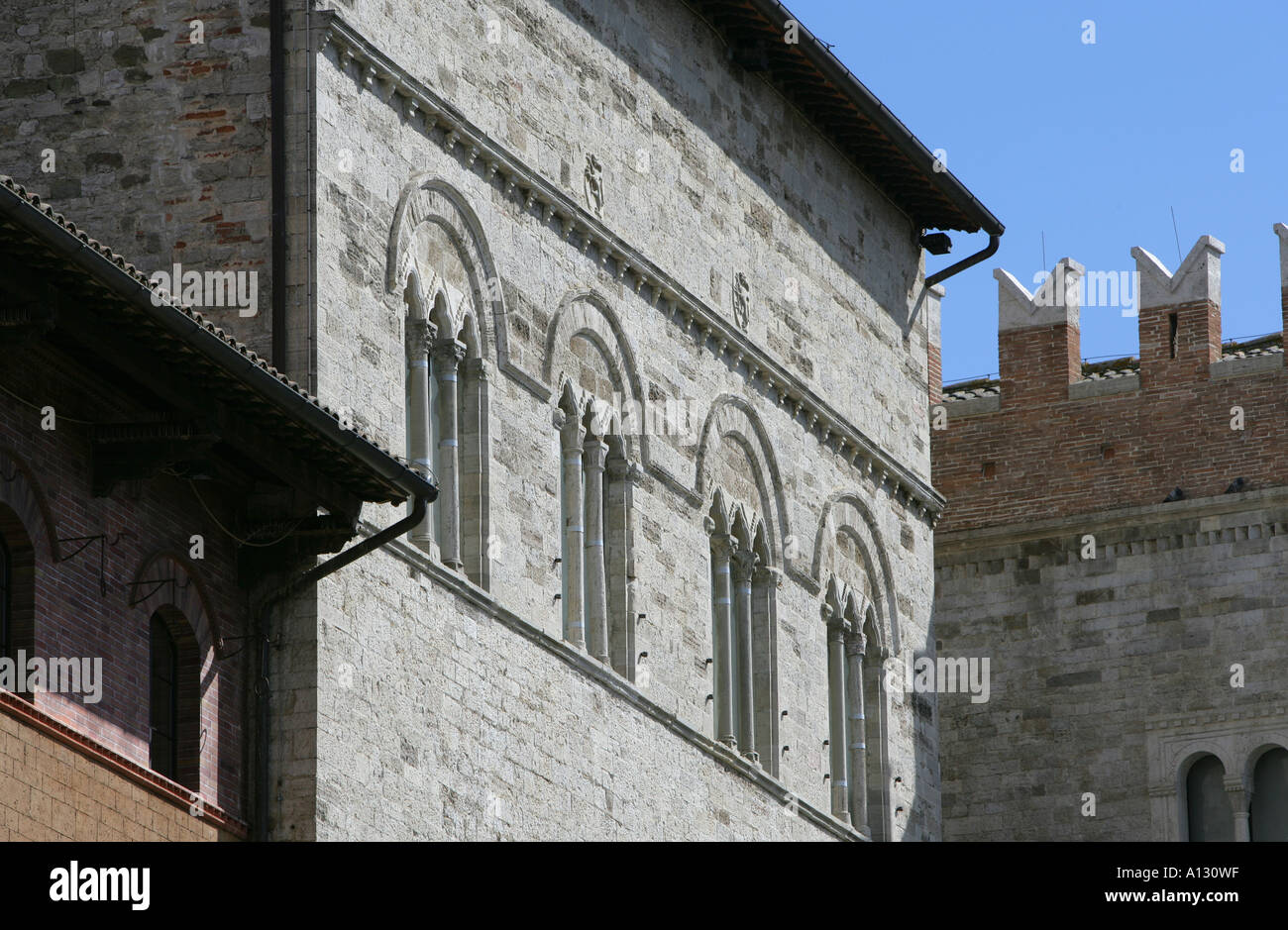 Arched detailing over windows in Todi, Umbria Italy. Stock Photo