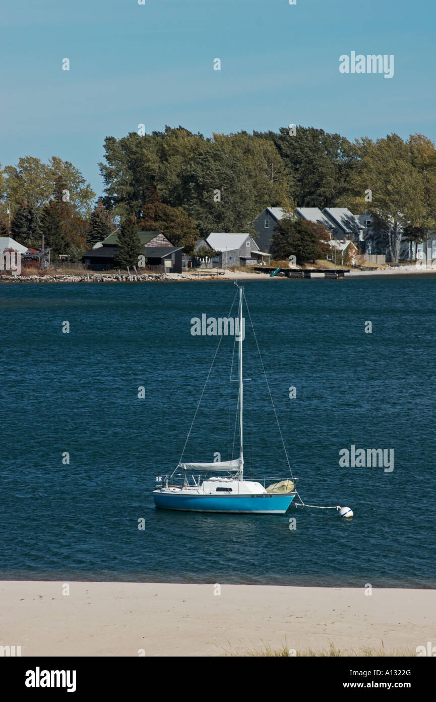A sail boat in the harbor at Grand Marais Michigan Stock Photo Alamy