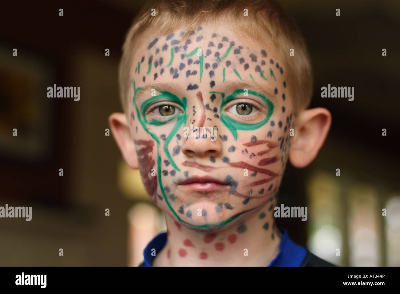 A boy with marker on his face Stock Photo - Alamy