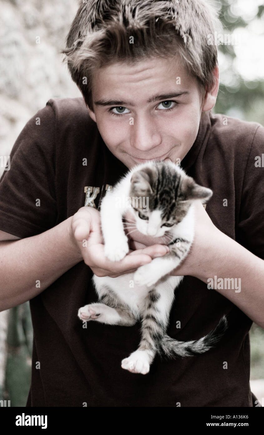 13 year old boy with a cat Stock Photo Alamy