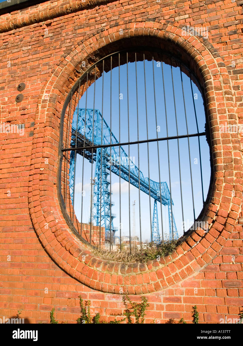 Middlesbrough transporter bridge viewed through an oval opening in the