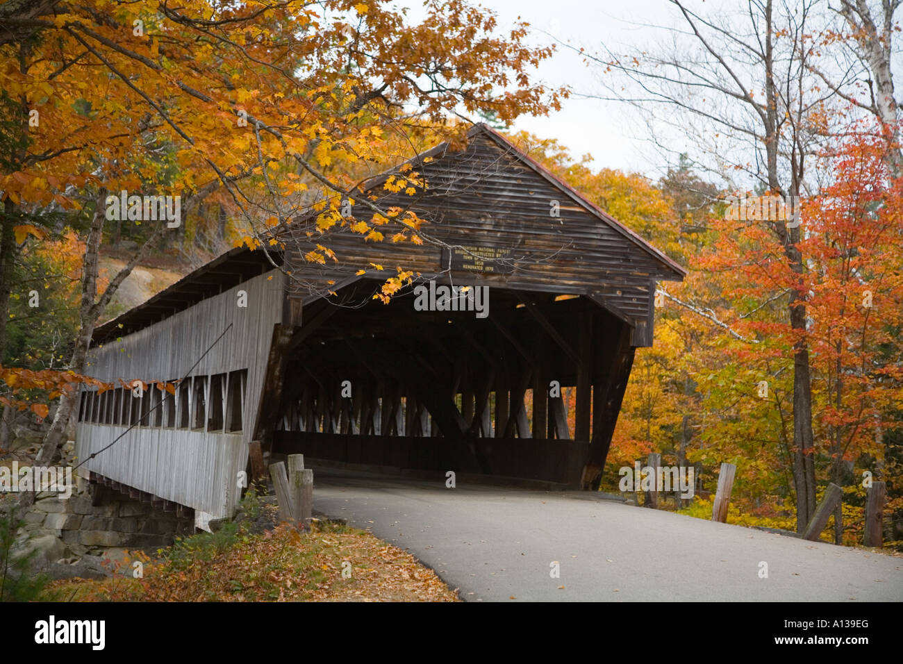 Covered Bridge in Fall Foliage Stock Photo - Alamy