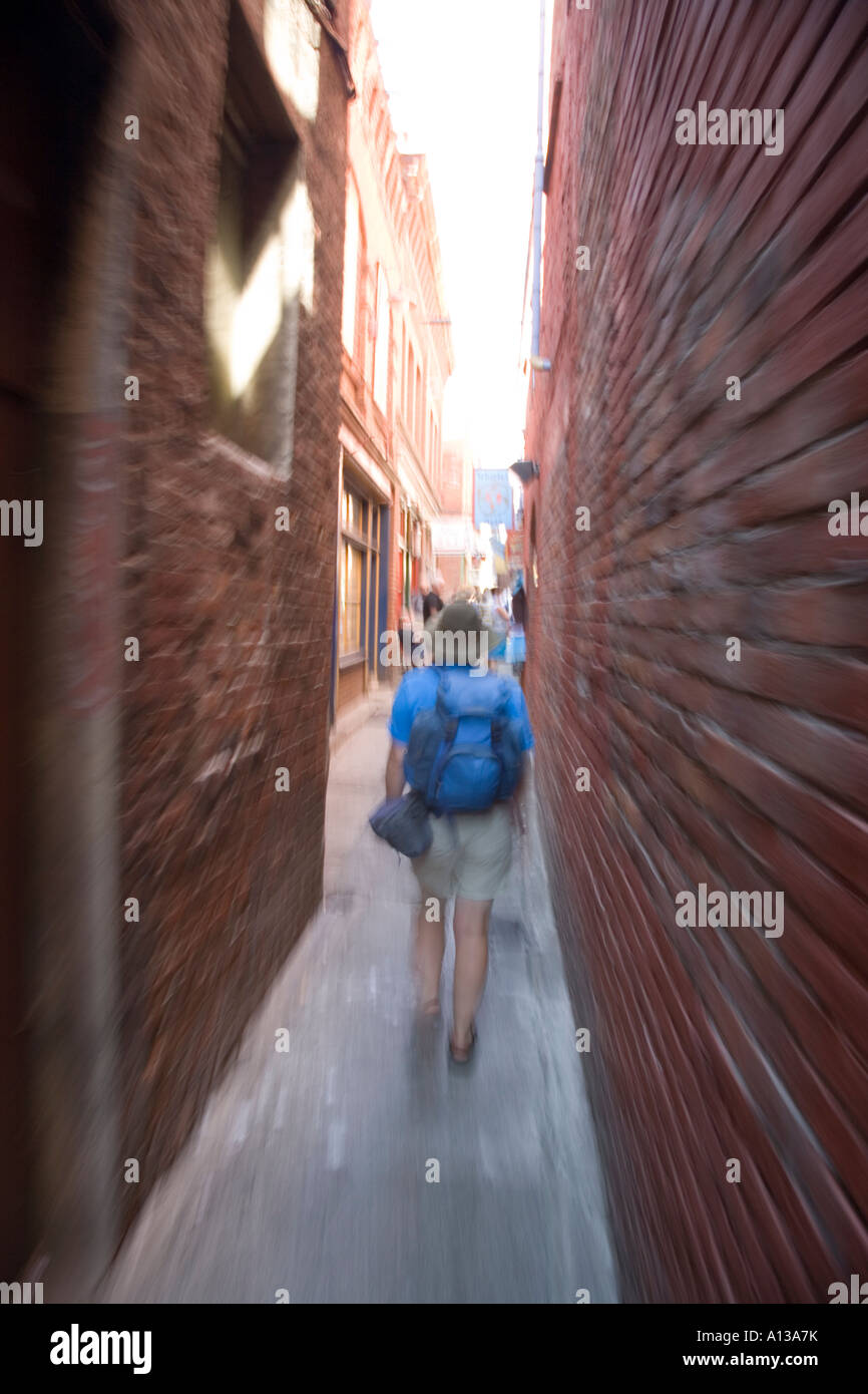 Walking into another world through Fan Tan Alley Chinatown Victoria Canada Stock Photo
