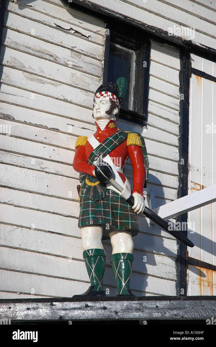 A ships figurehead mounted on the old stores building Viking Bay