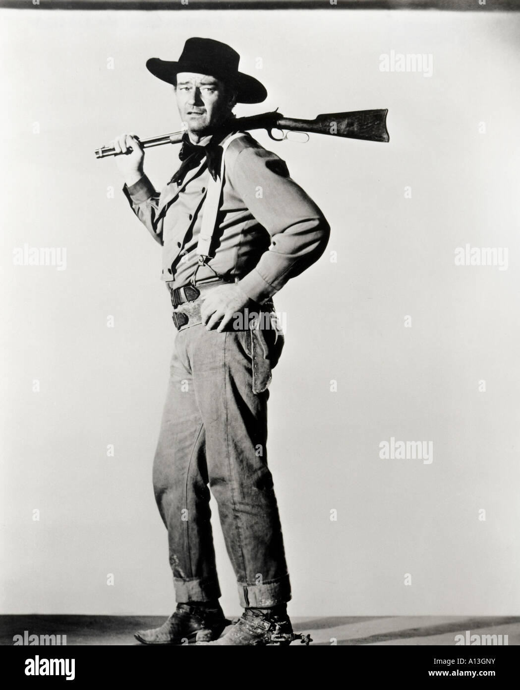 The Searchers Year 1956 Director John Ford John Wayne Shooting picture Stock Photo
