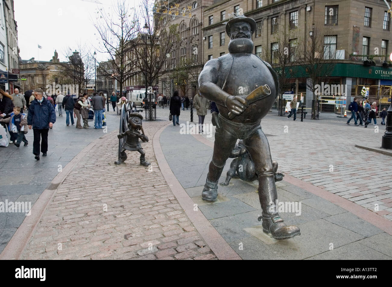 Statues of Desperate Dan and Minnie the mix in Dundee city centre The