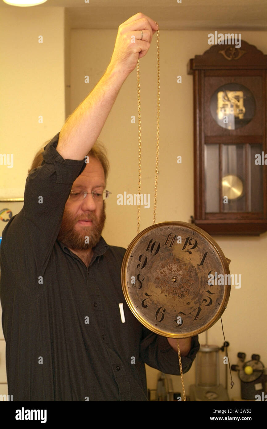 Clockmaker restore clock hi-res stock photography and images - Alamy