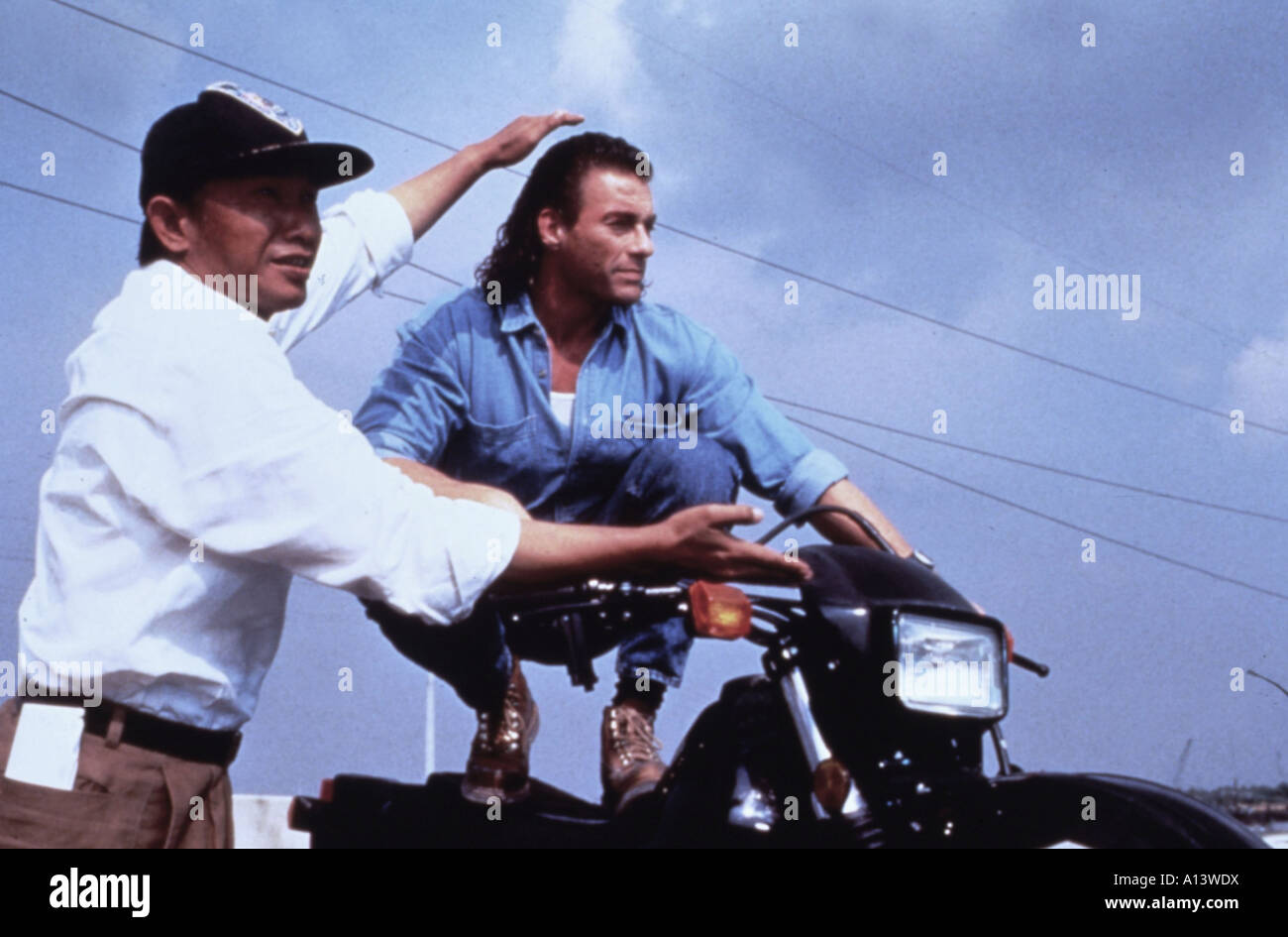 John Woo and Jean Claude Van Damme Director Actor Shooting picture from the  movie Hard target Stock Photo - Alamy