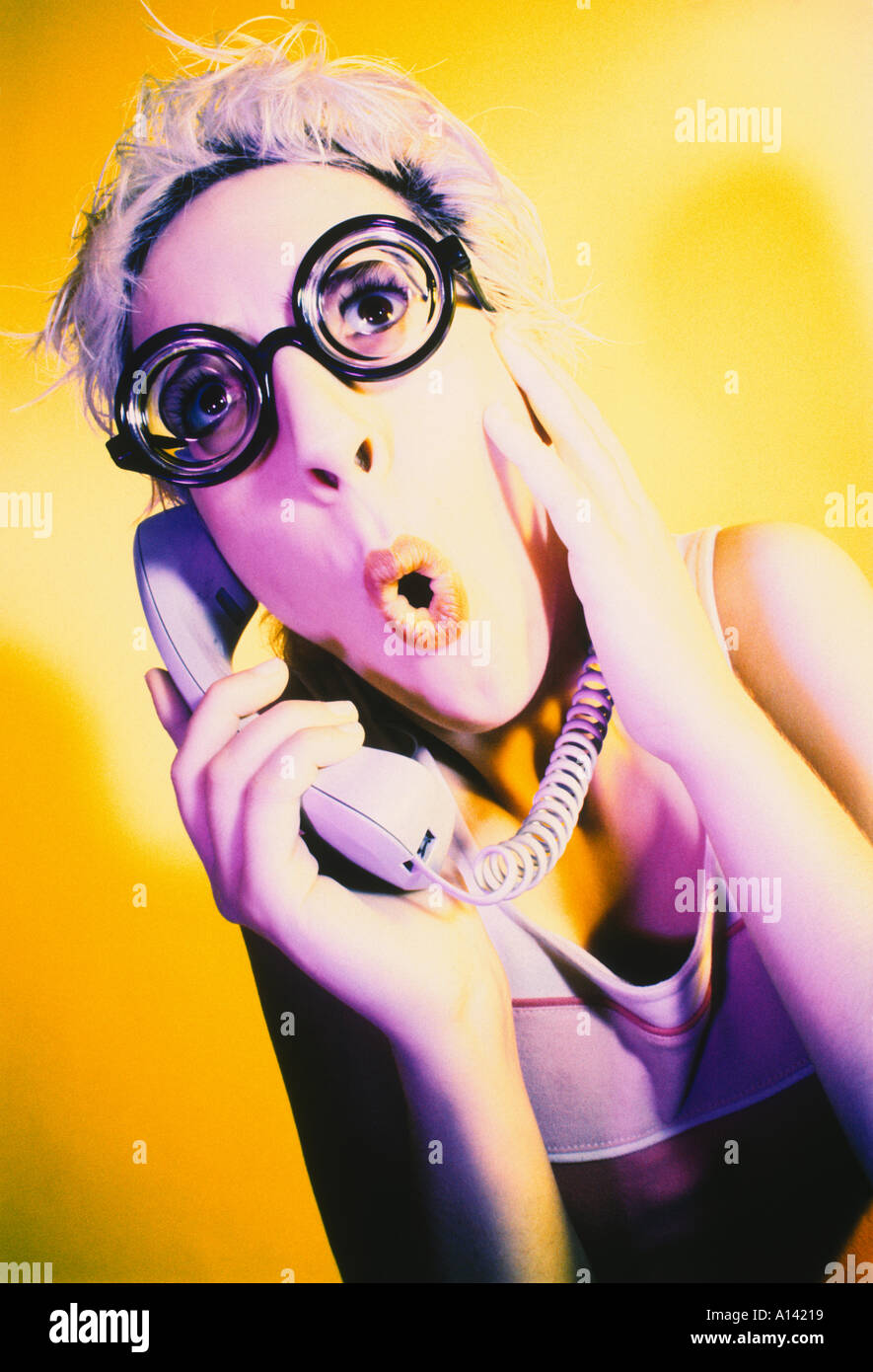 ENGAGED IN SURPRISING SHOCKING CONVERSATION ON TELEPHONE Stock Photo Alamy