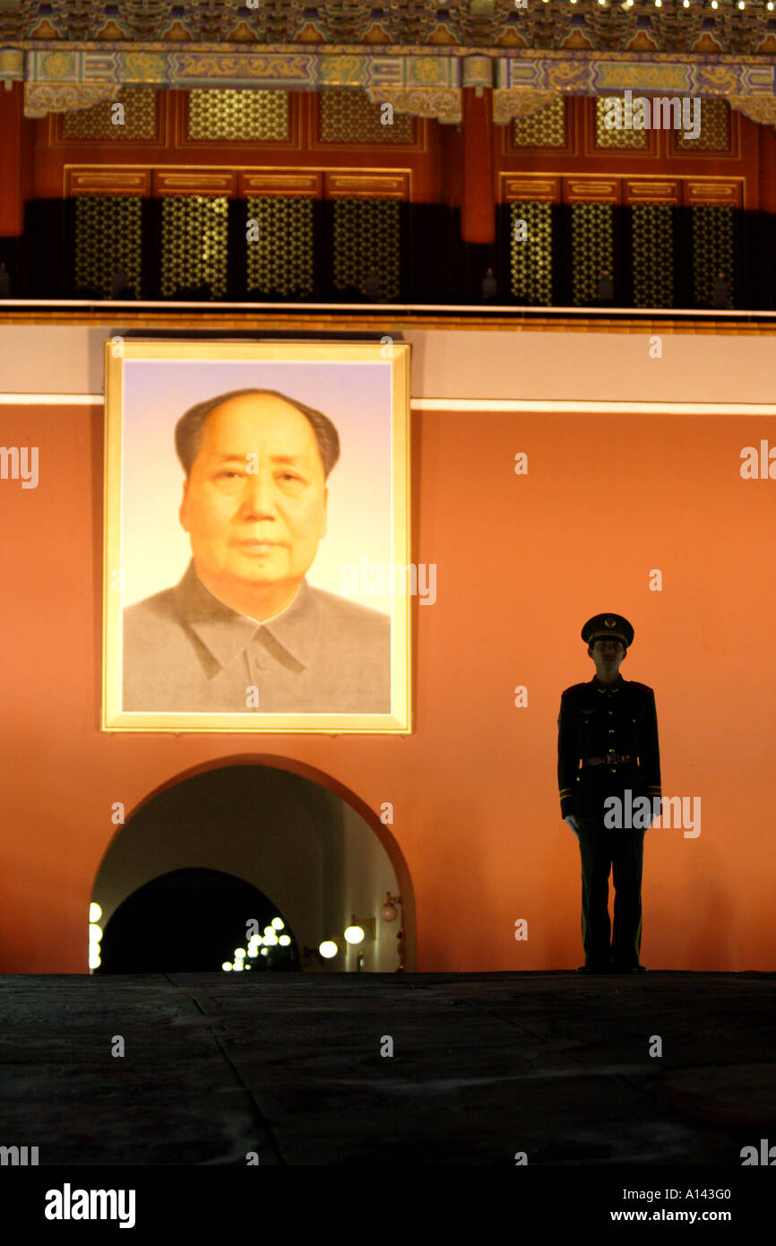 Silhouette of a soldier at Forbidden City Gate of Heavenly Peace,  Beijing  China, Mao Zedong Portrait Stock Photo