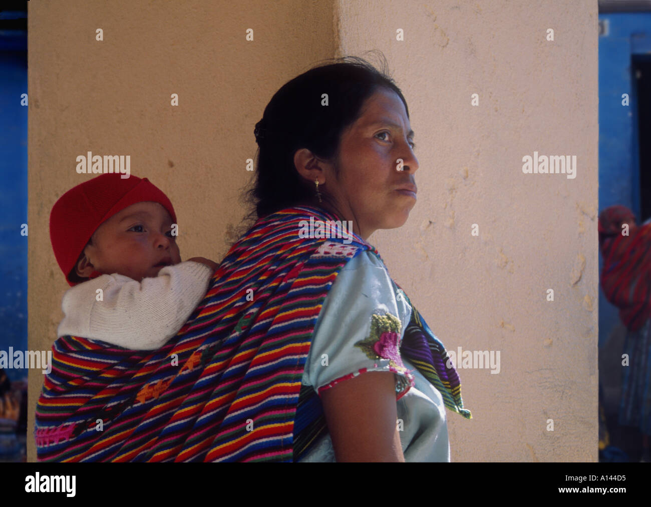 Indian woman carrying baby back hi-res stock photography and images - Alamy