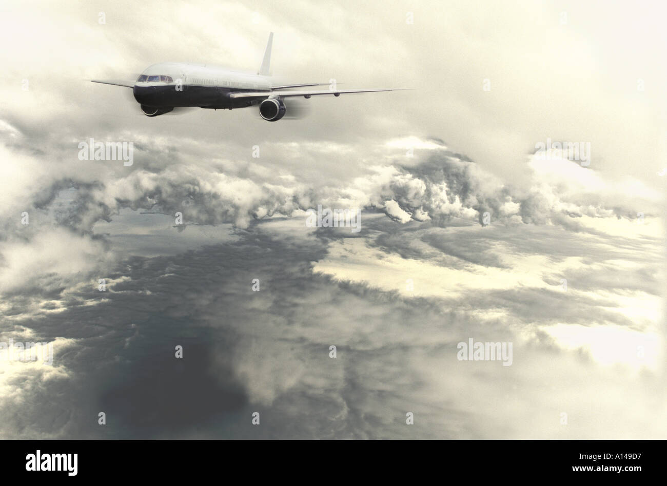 Aeroplane flying above the clouds Stock Photo - Alamy