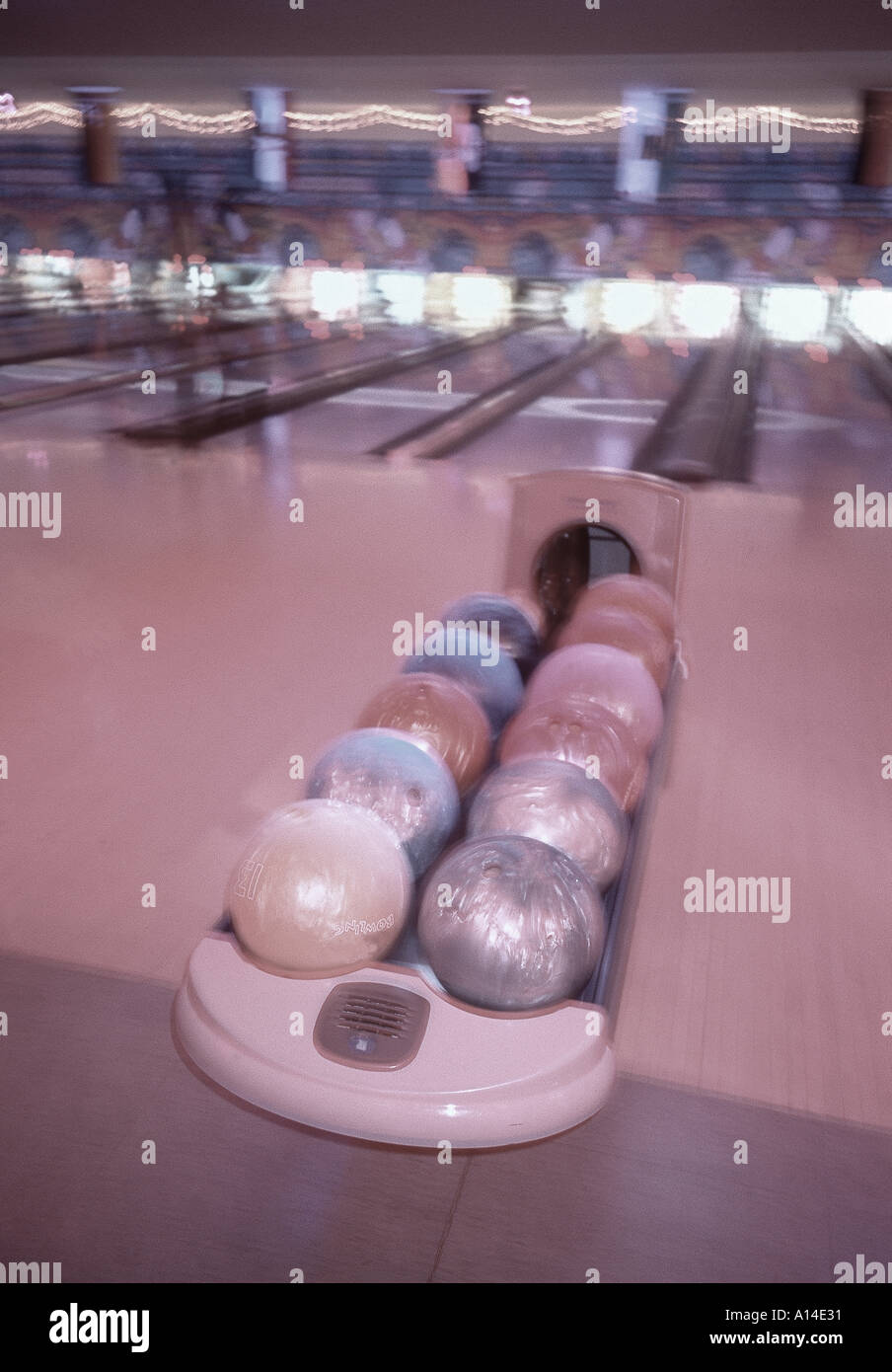 bowling alley with bowls at bowling center Stock Photo