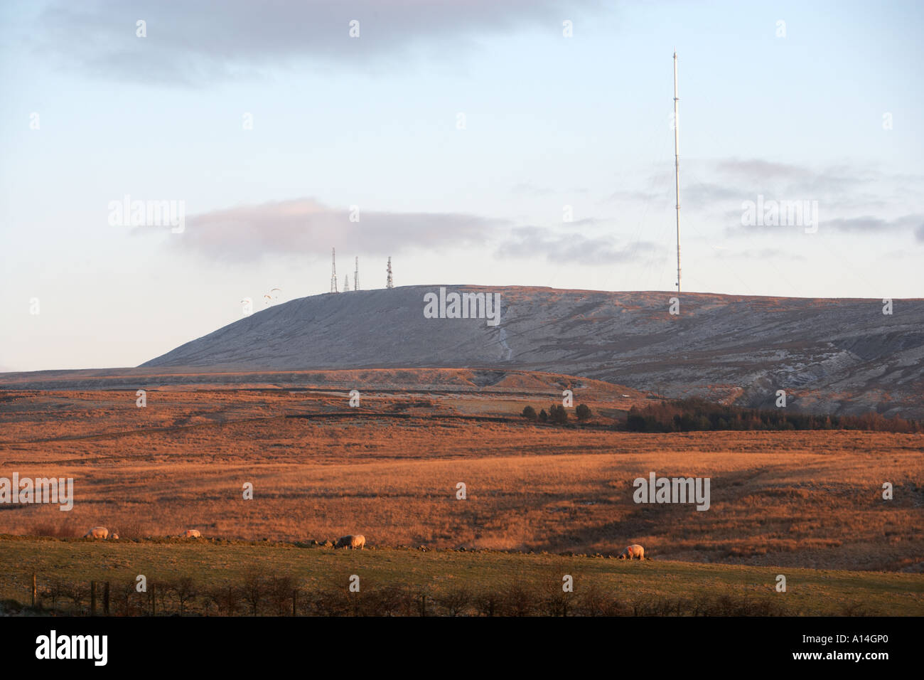 distant hang gliders rising on thermal currents Stock Photo