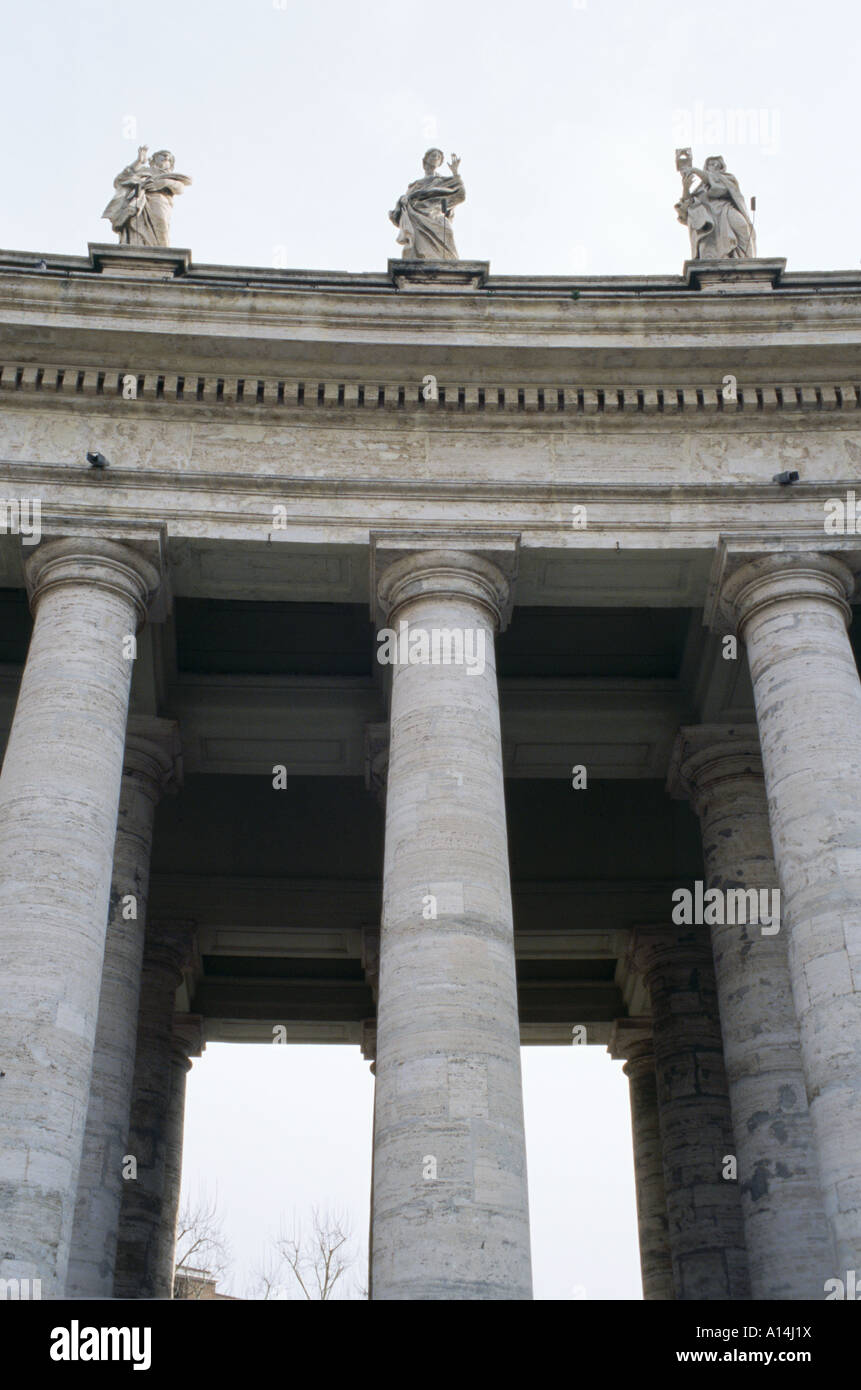 Columns and statues in St Peters Square Berninis Square Piazza Saint Pietro Vatican City Rome Italy Stock Photo
