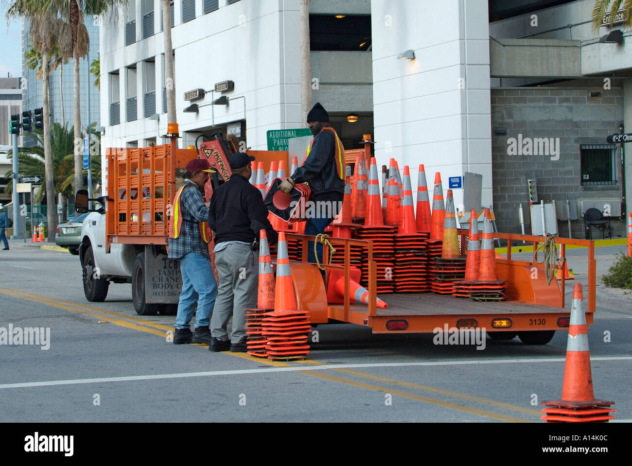 Workers collect street pilon in downtown Tampa florida Stock Photo