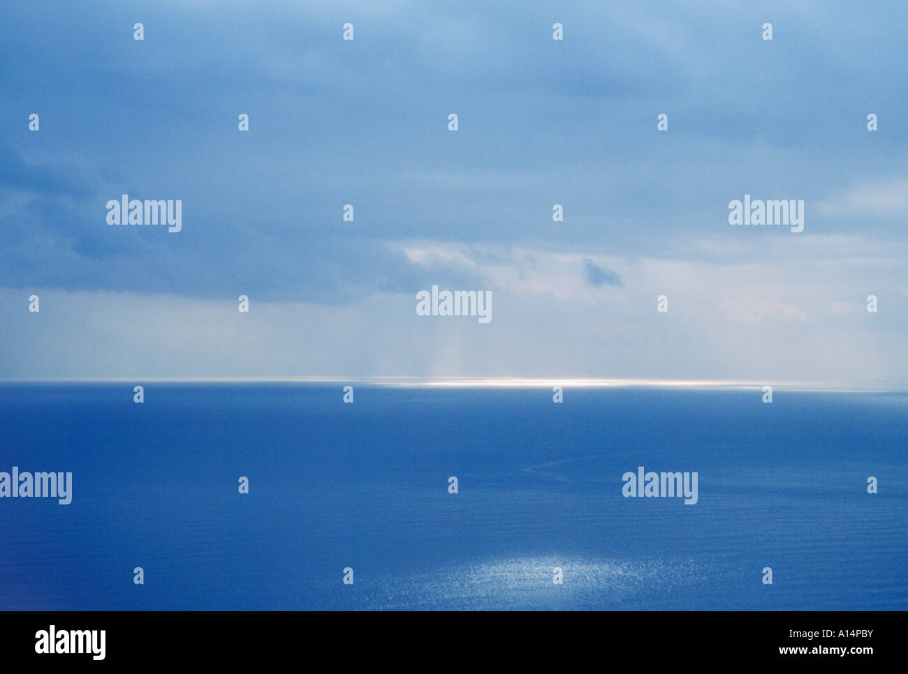 Sun rays and clouds over the Ligurian Sea off the coast of Italy Stock ...