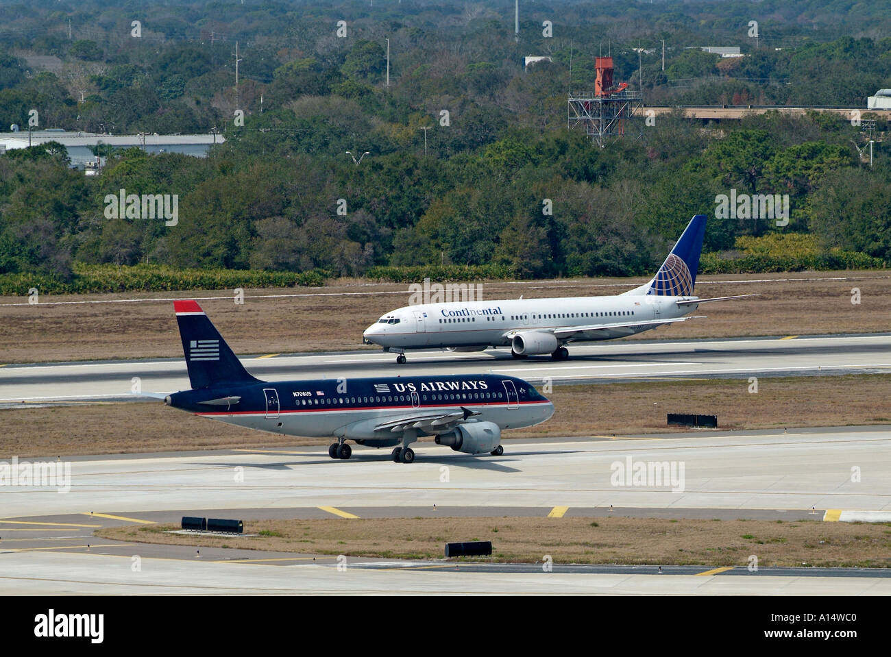Airline jets take off and land at Tampa International airport Florida