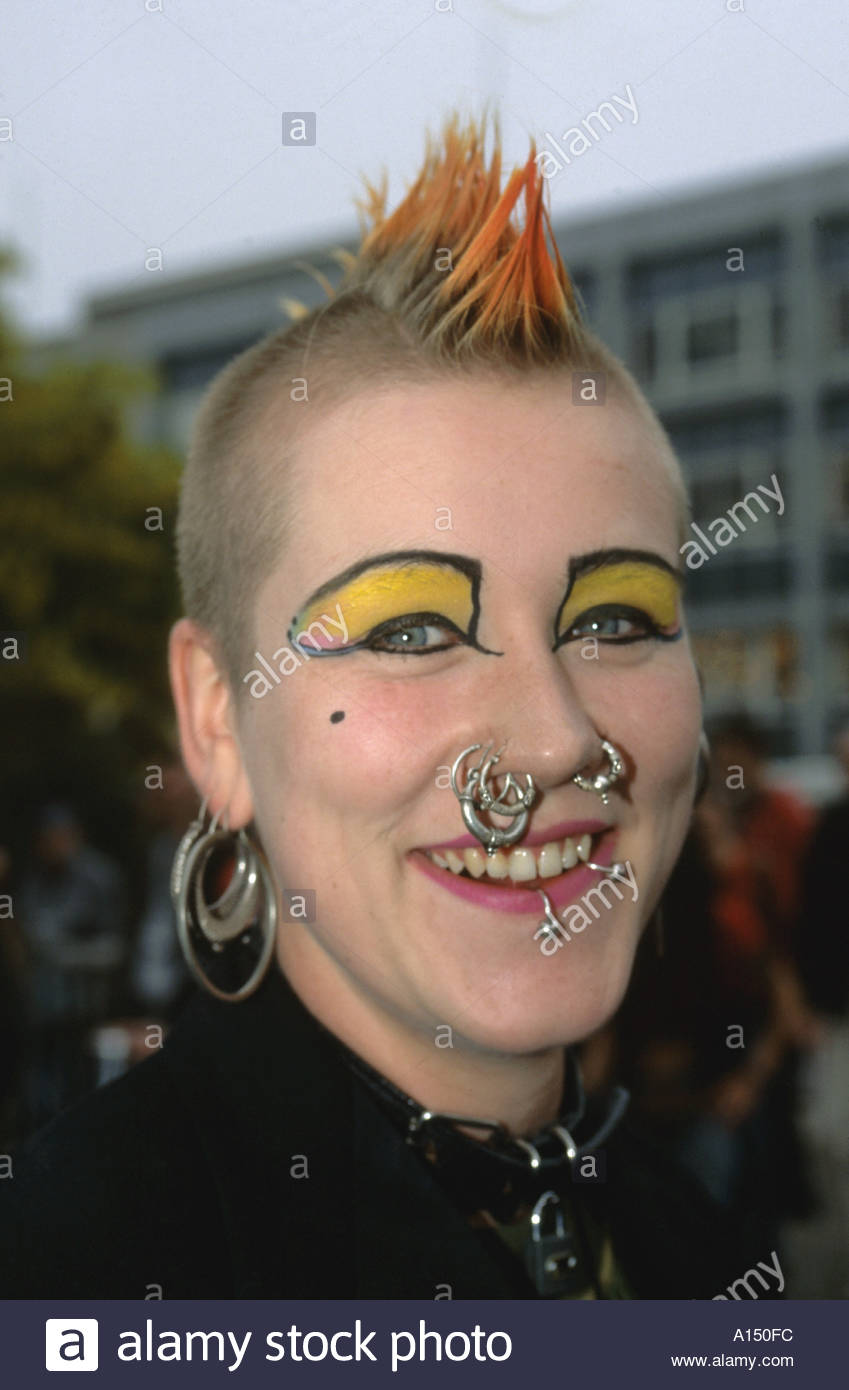 Young female punk with mohican hairstyle and face 