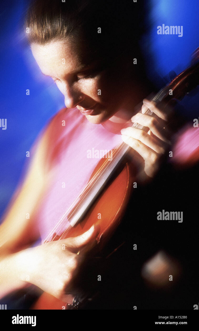 young woman posing with violin Stock Photo - Alamy