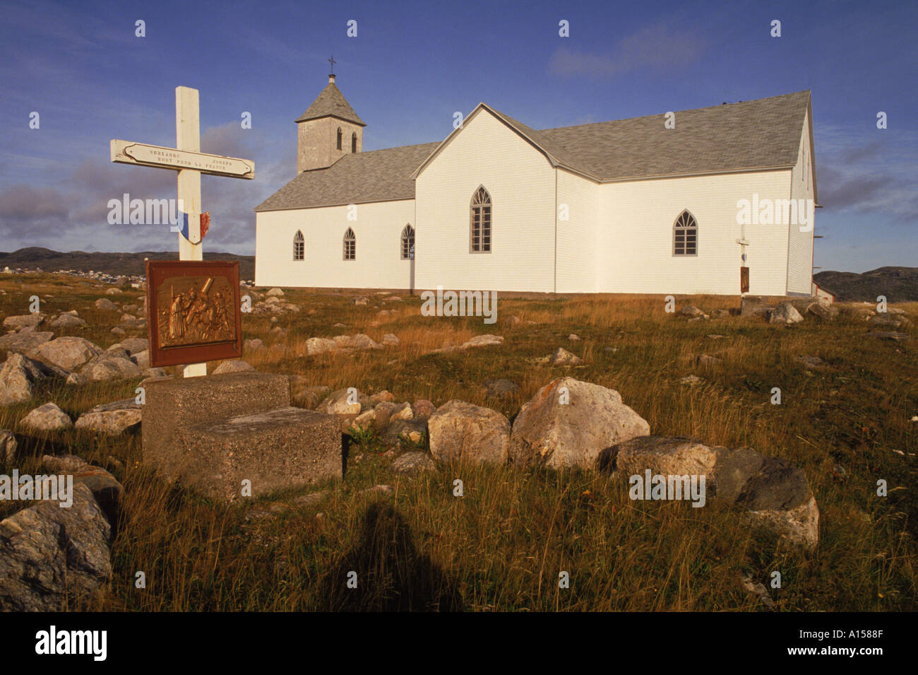 Station of the Cross and church at St Pierre et Miquelon on the Isle aux Marins an island near Newfoundland Canada K Gillham Stock Photo