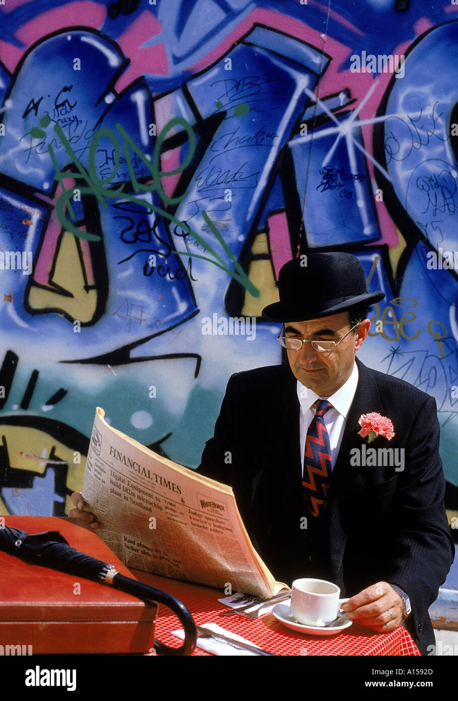 Businessman wearing bowler hat hi-res stock photography and images - Alamy