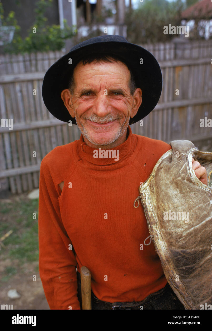 Portrait of an old man wearing a black hat at Hobbitza village in south west Romania A Woolfitt Stock Photo