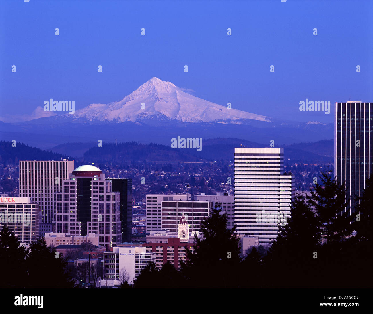 Mount Hood and downtown Portland Oregon USA skyline at sunset Stock