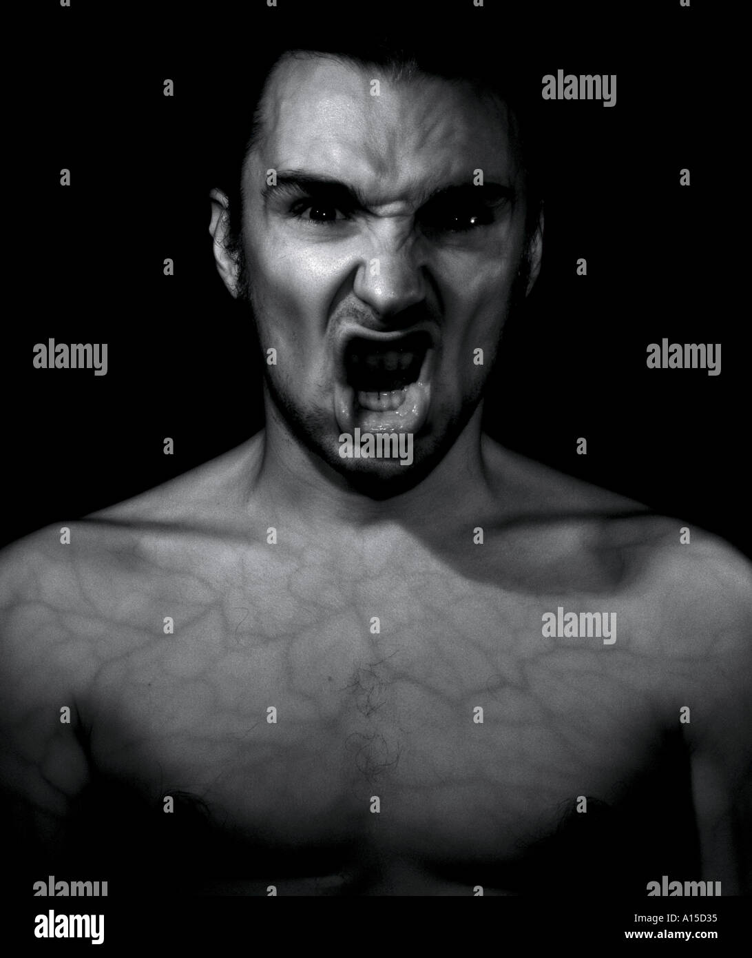 Bust of a man screaming in rage Stock Photo - Alamy