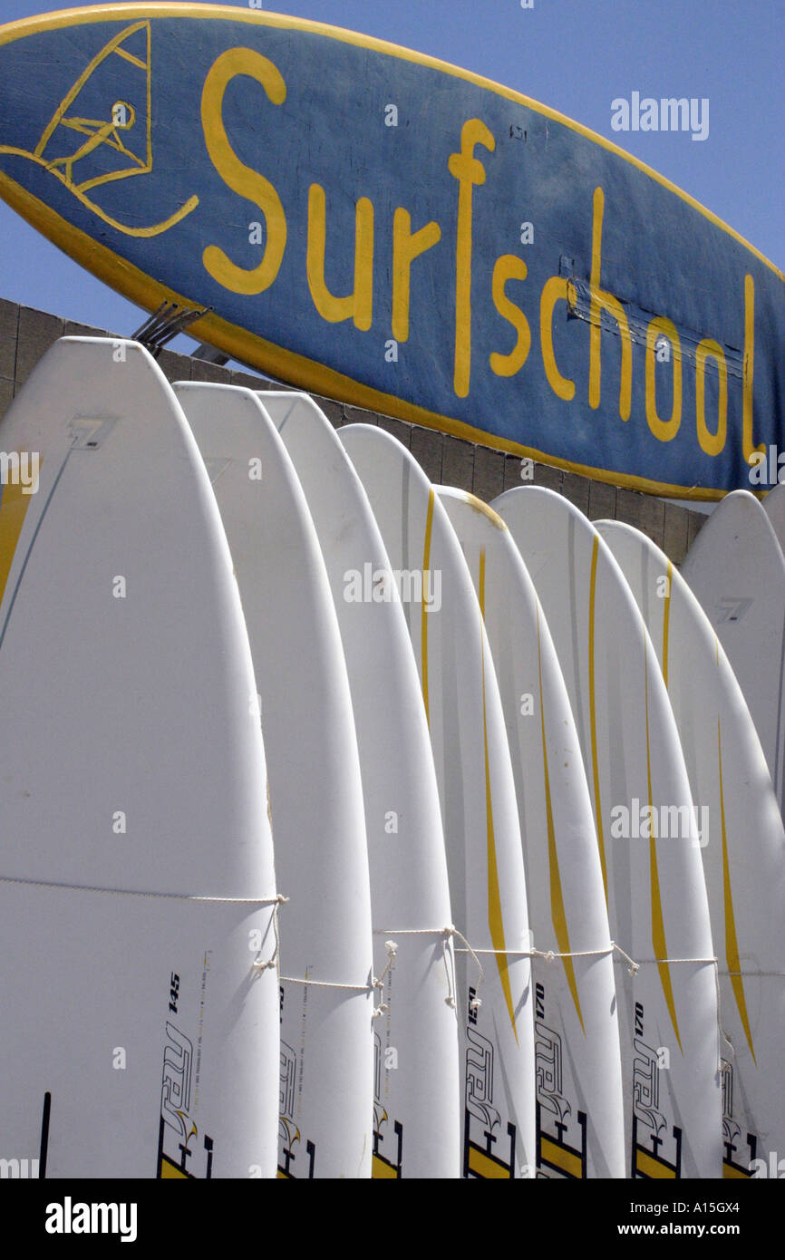 Surfboard stack at surf school Stock Photo
