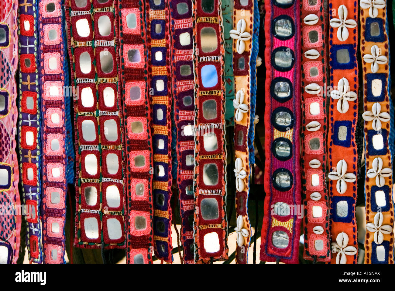 Indian craft material with mirrors on market stall Stock Photo Alamy