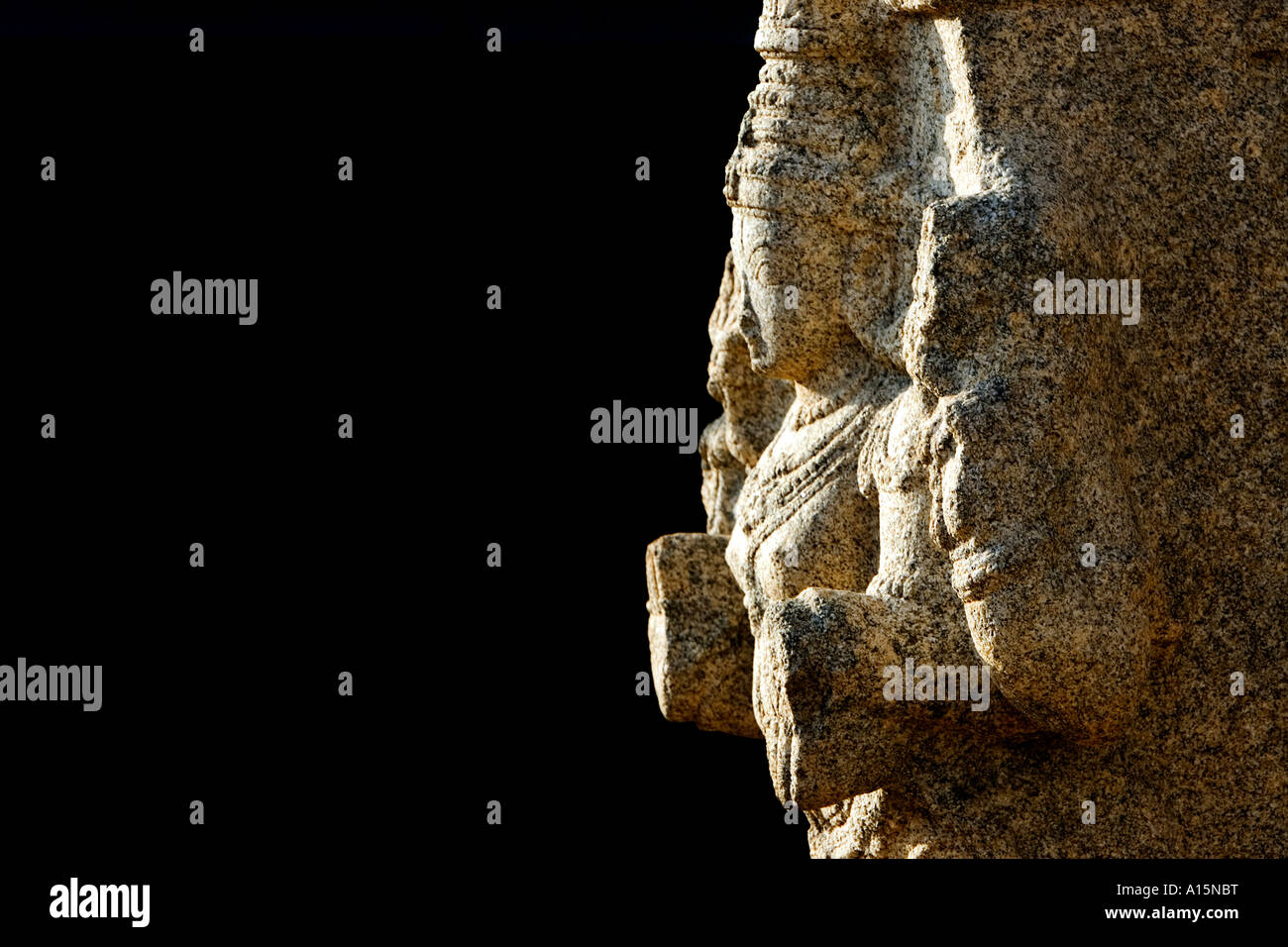 Indian goddess deity carved into a stone pillar at a Veerabhadra Temple in Lepakshi, Andhra Pradesh, India Stock Photo