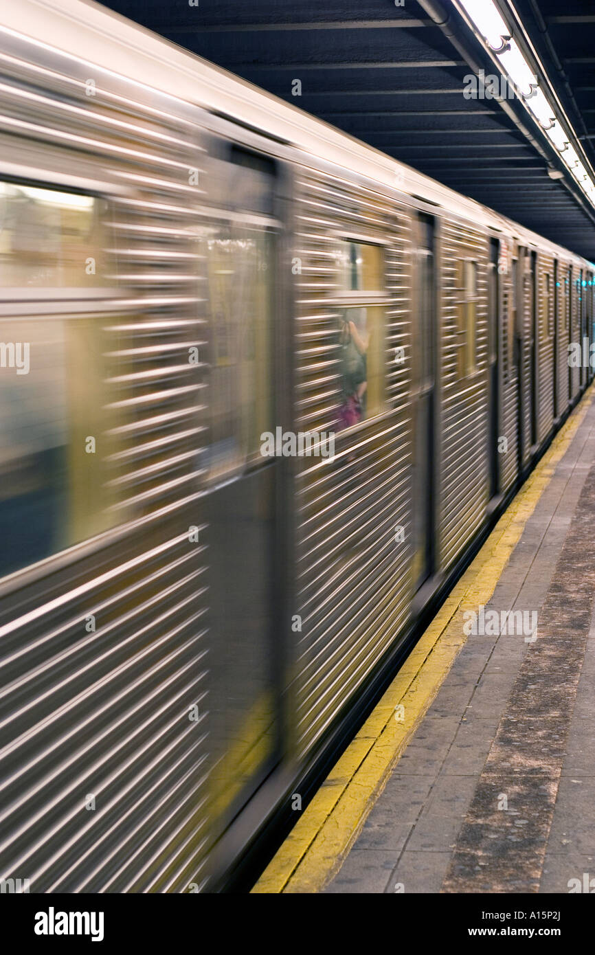 New York City subway train in station Stock Photo
