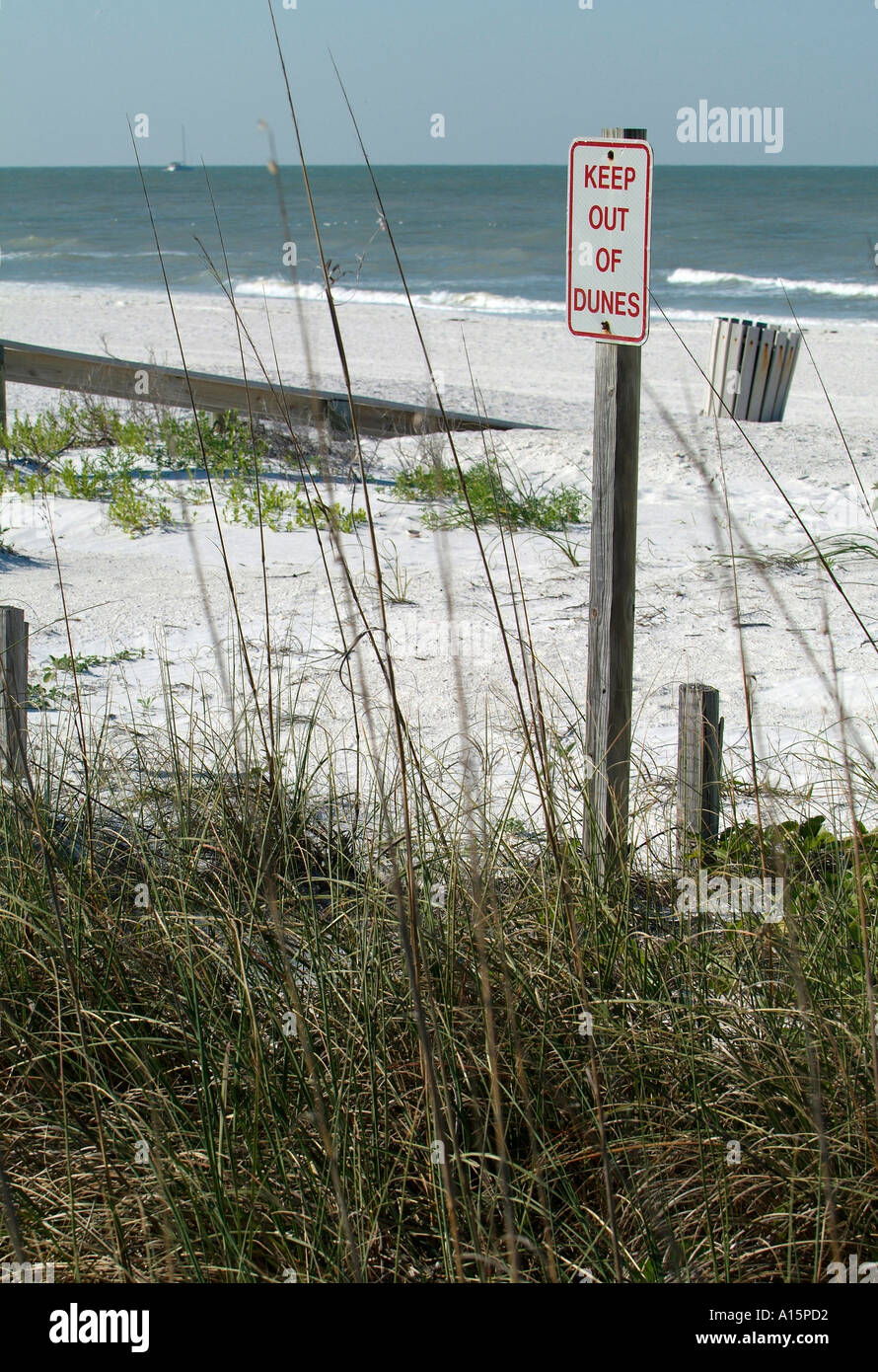 Signs along the St Pete Florida beach regulating use and protecting the environment Stock Photo