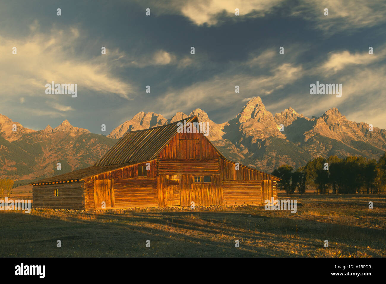 Moulton Barn and Teton Mountains at sunrise Stock Photo