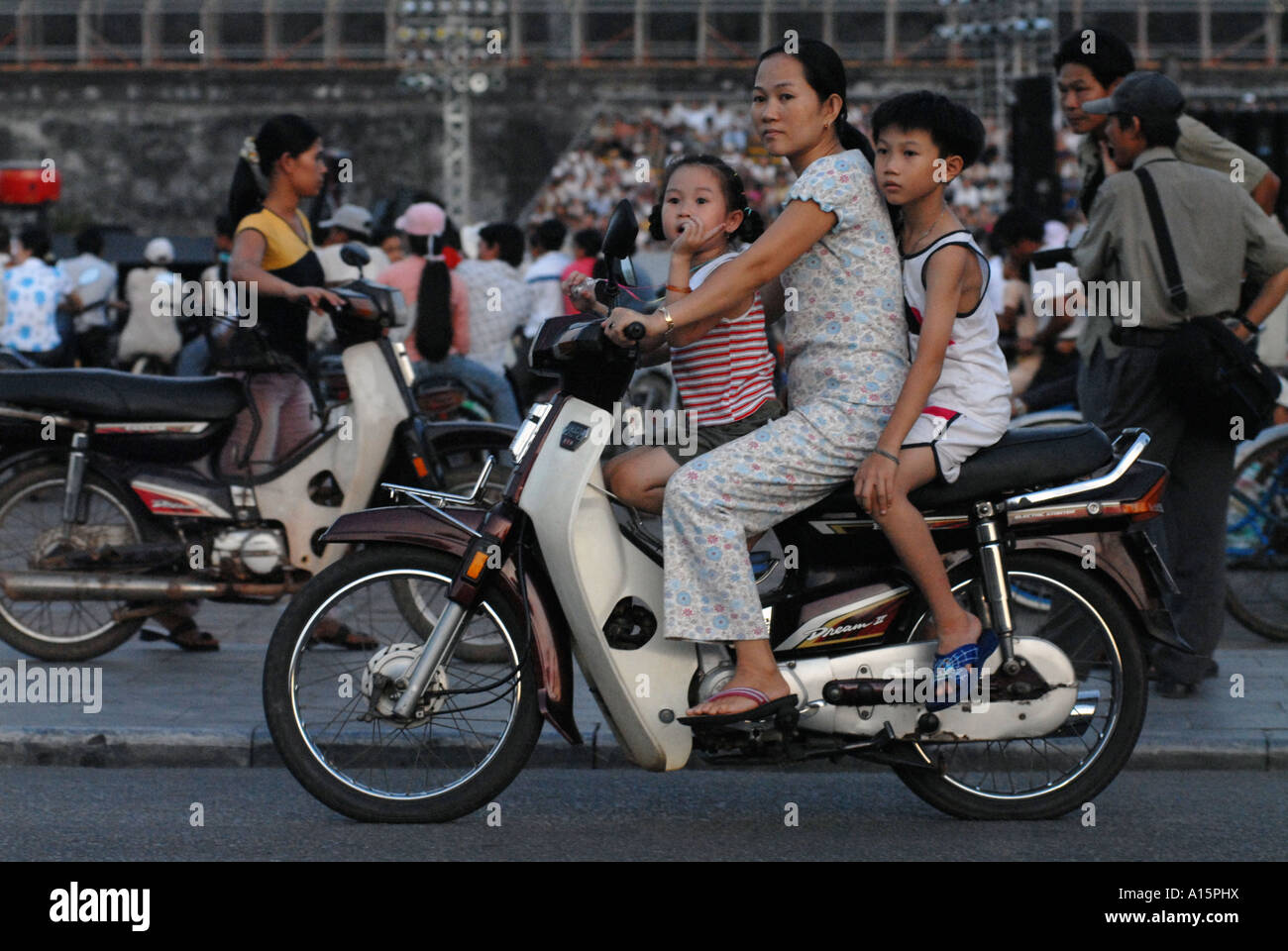 Vietnamese Motorcycle Rider Vietnamese people riding a motorcycle hi-res stock photography and ...