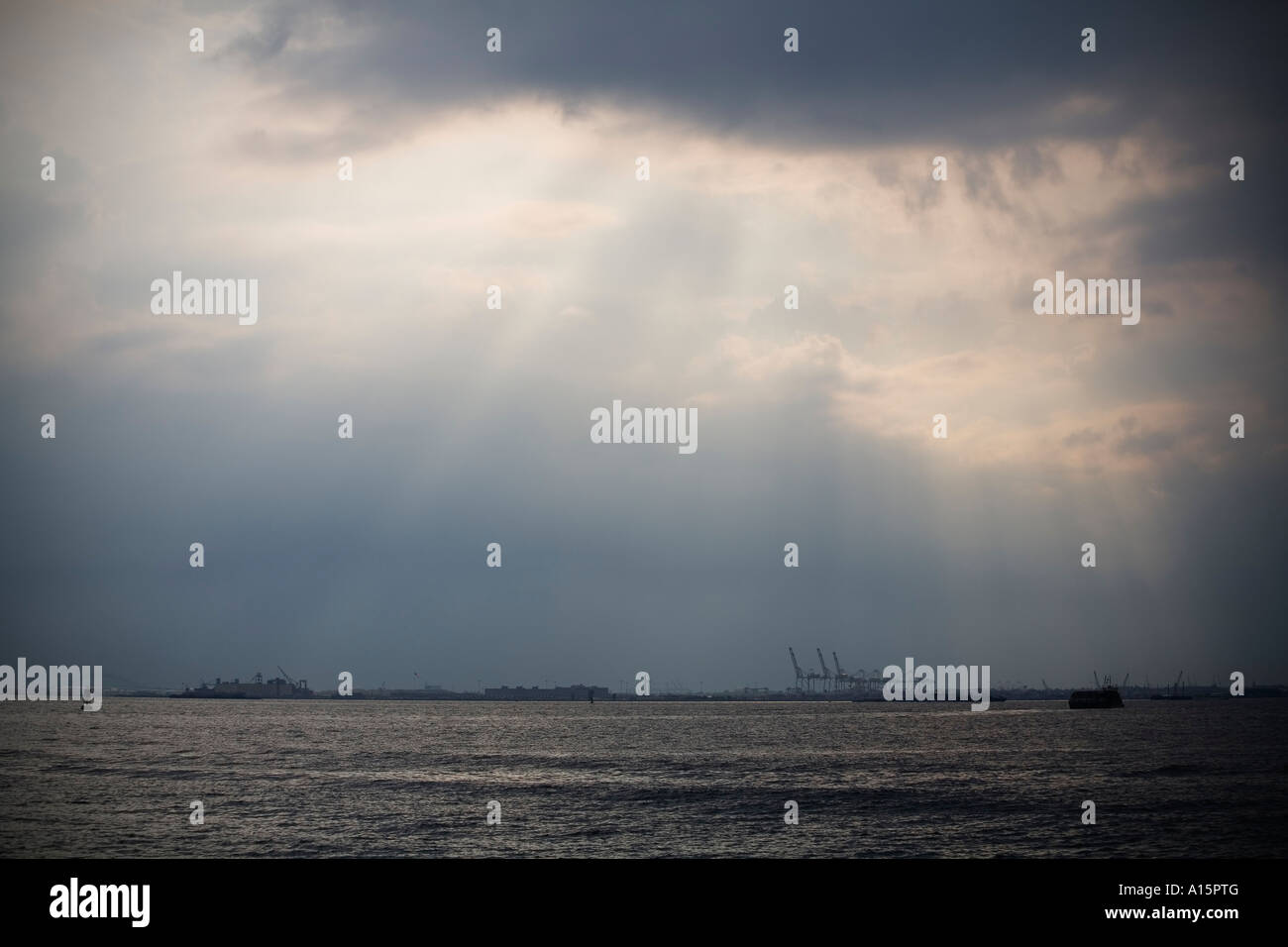 sun shining through clouds Stock Photo - Alamy