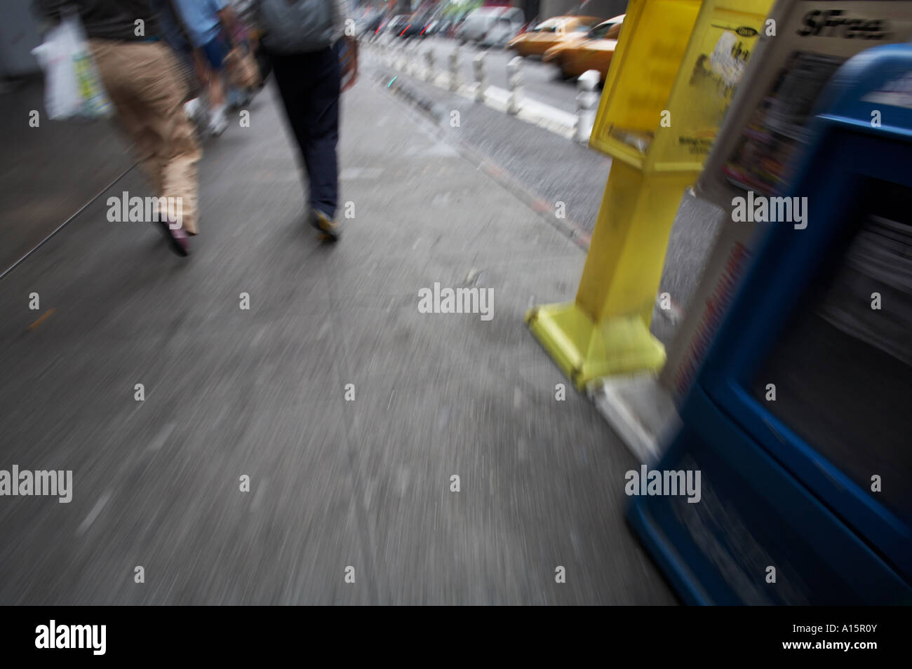 people walking on sidewalk Stock Photo