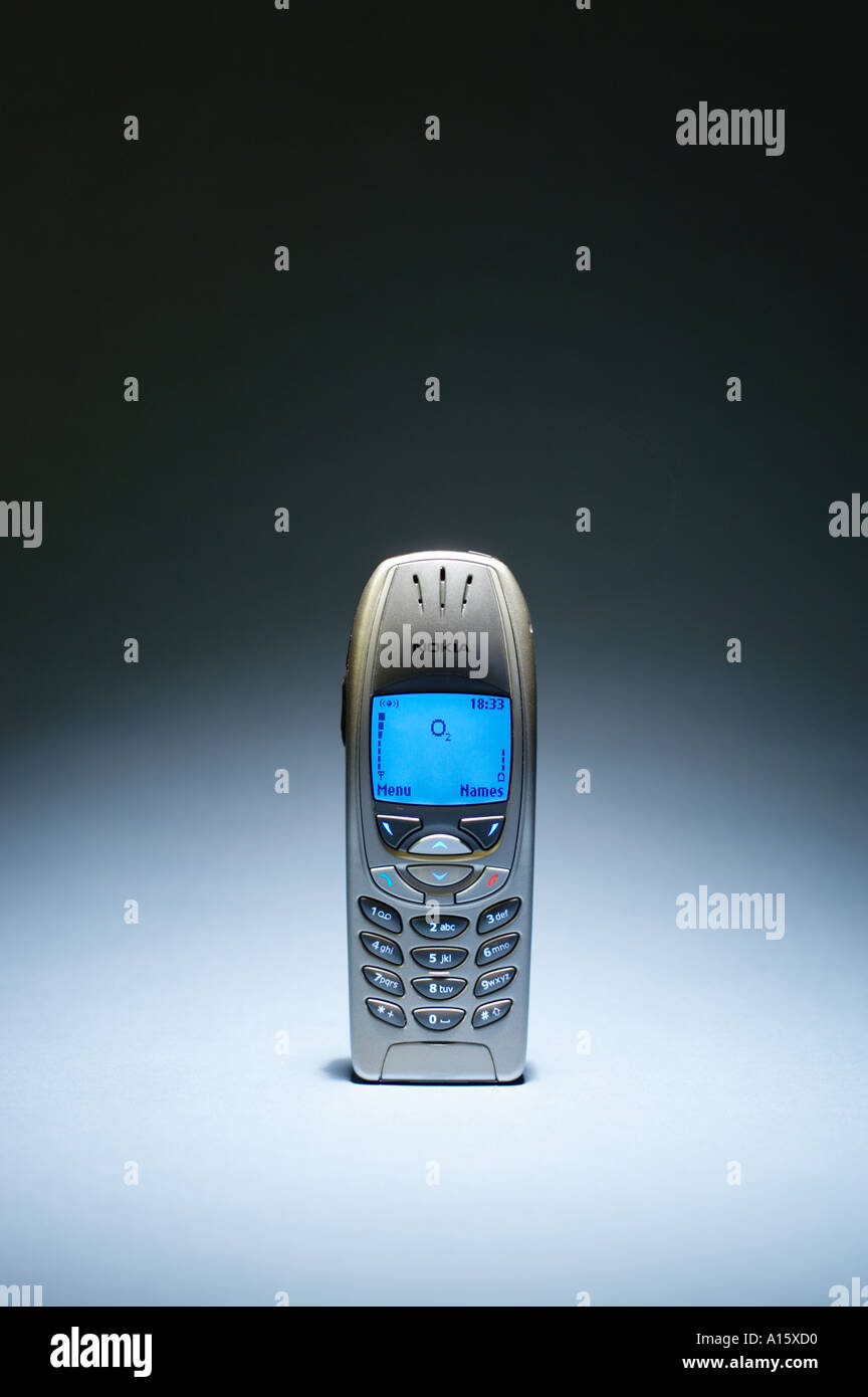 Old Nokia 6310i mobile phone with LCD lit Stock Photo