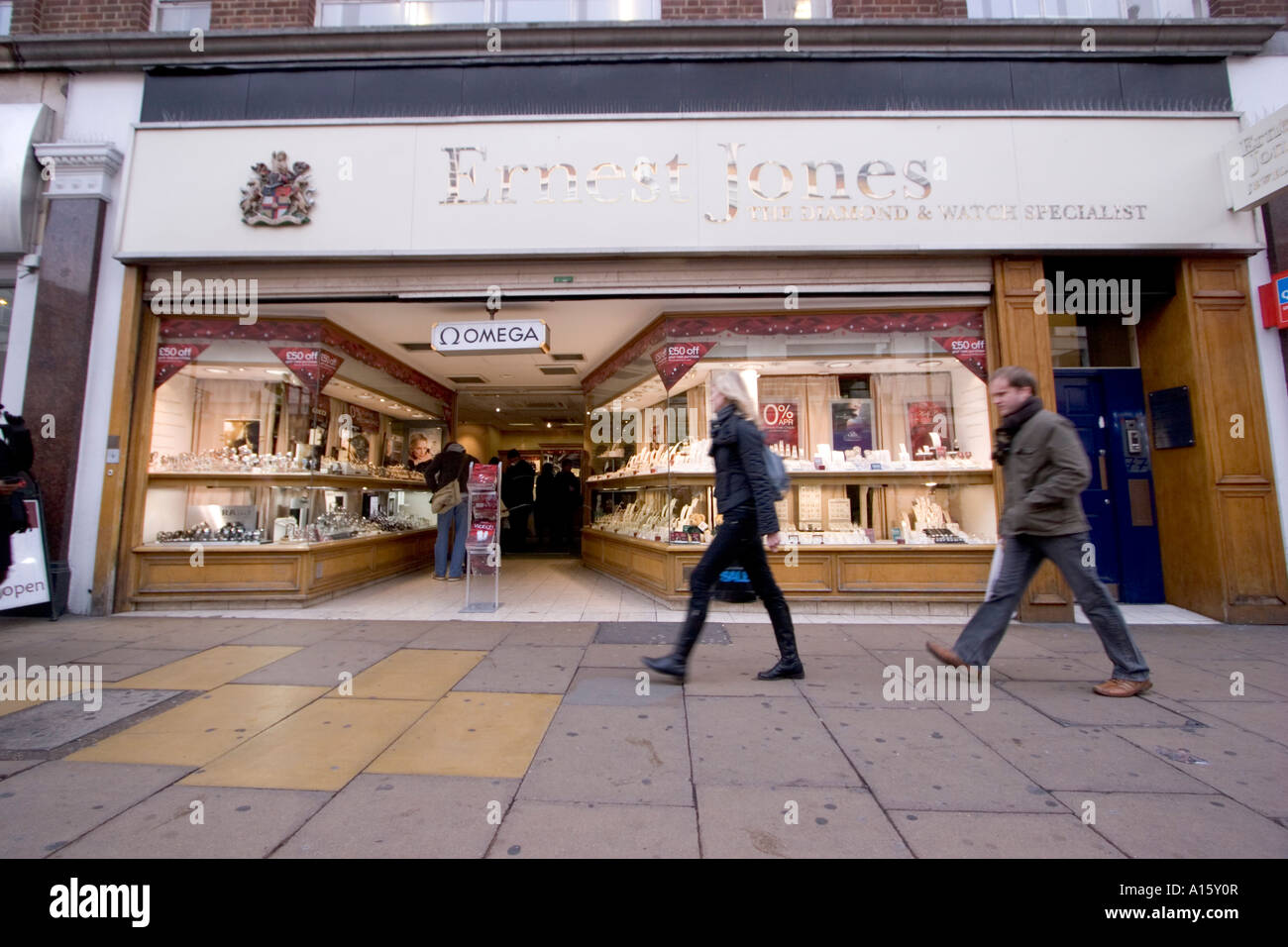 Oxford Street stores at Christmas Xmas Exterior of Ernest Jones jewellers Stock Photo