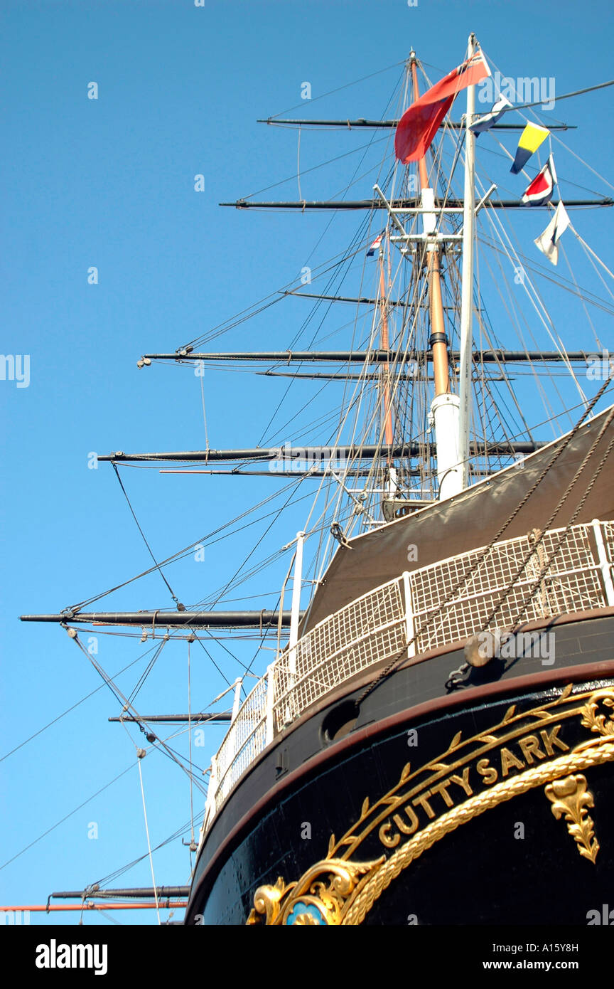 Vertical close up of decorative black and gold stern of the 'Cutty Sark' clipper ship on a sunny day. Stock Photo