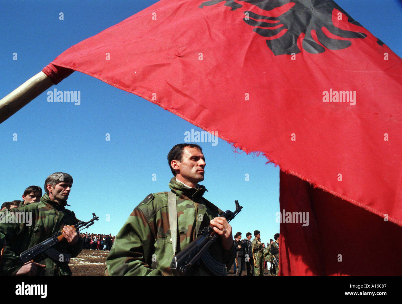 Soldiers in the Kosovo Liberation Army honor the anniversary of their struggle February 28 1999 in Lapiste Kosovo. Stock Photo