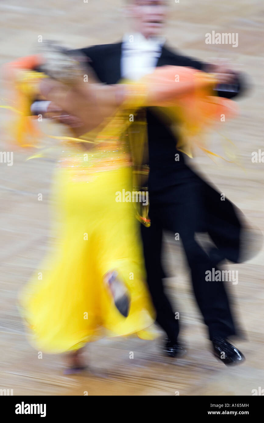 Professional Ballroom Dancers Performing In The Standard Dance