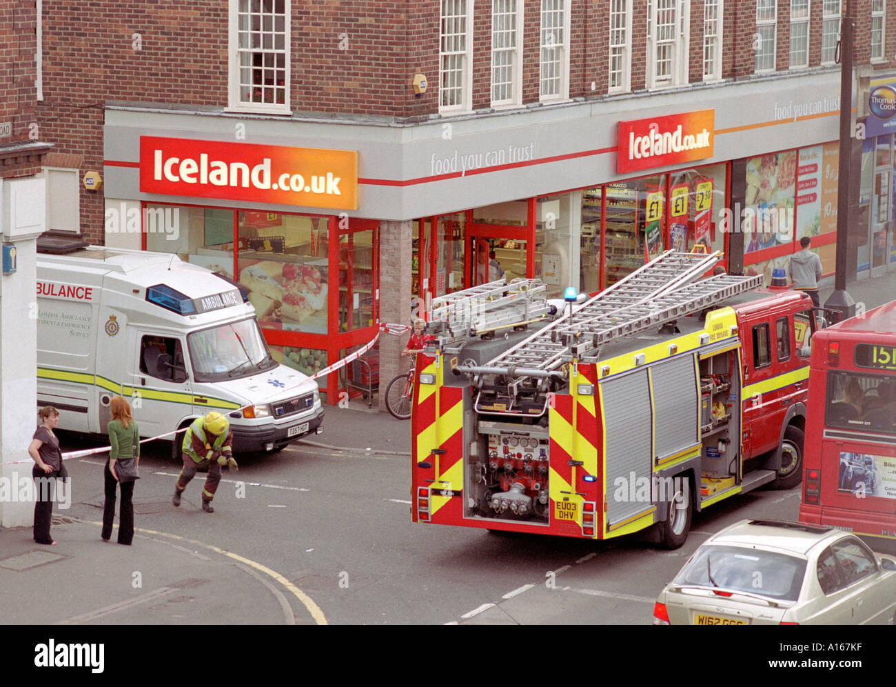 Emergency services attending an incident in a busy London Road. Stock Photo